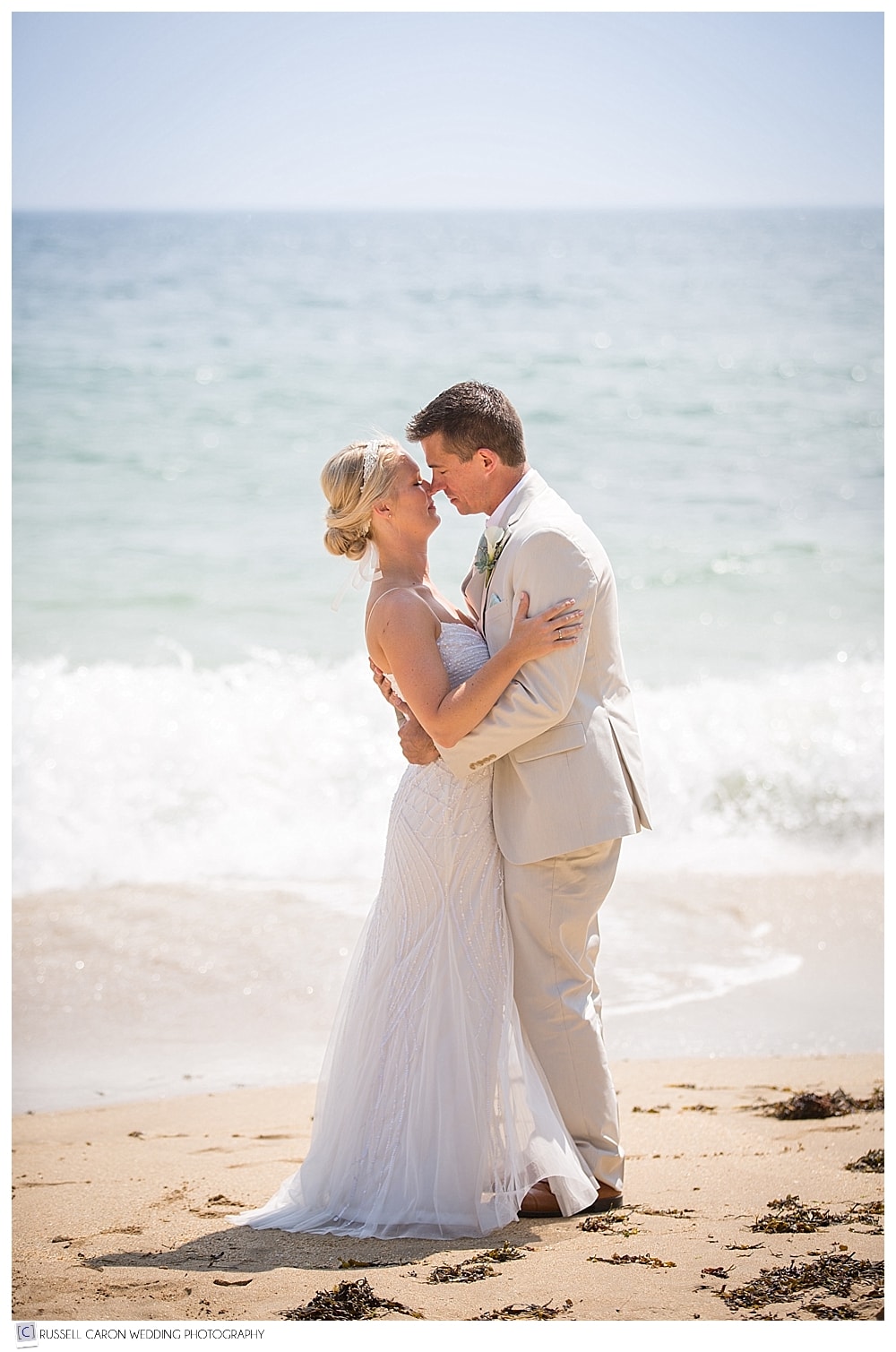 bride and groom in acadia national park sand beach, Bar Harbor Maine wedding photographers