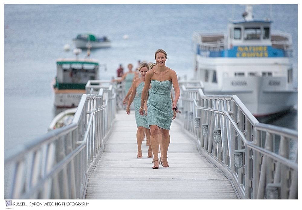 bridesmaids arrive by boat at Atlantic Oceanside wedding