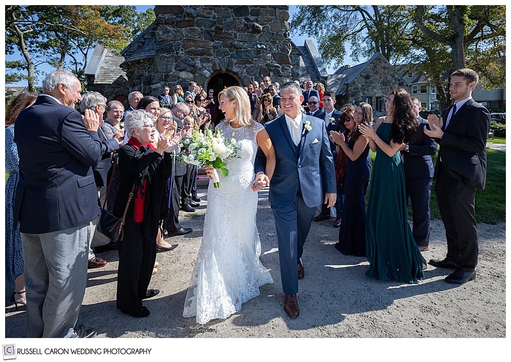 bride and groom during their recessional at their Saint Ann's Episcopal Church wedding, Kennebunkport, Maine