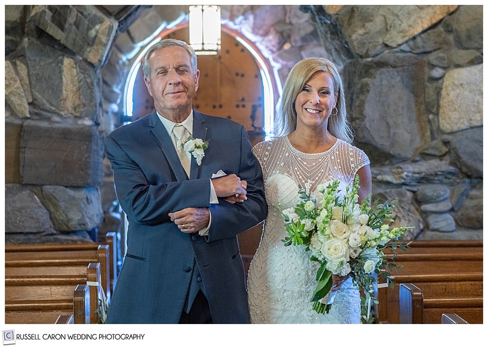 bride and her father walking down the aisle of Saint Ann's Episcopal Church, Kennebunkport, Maine