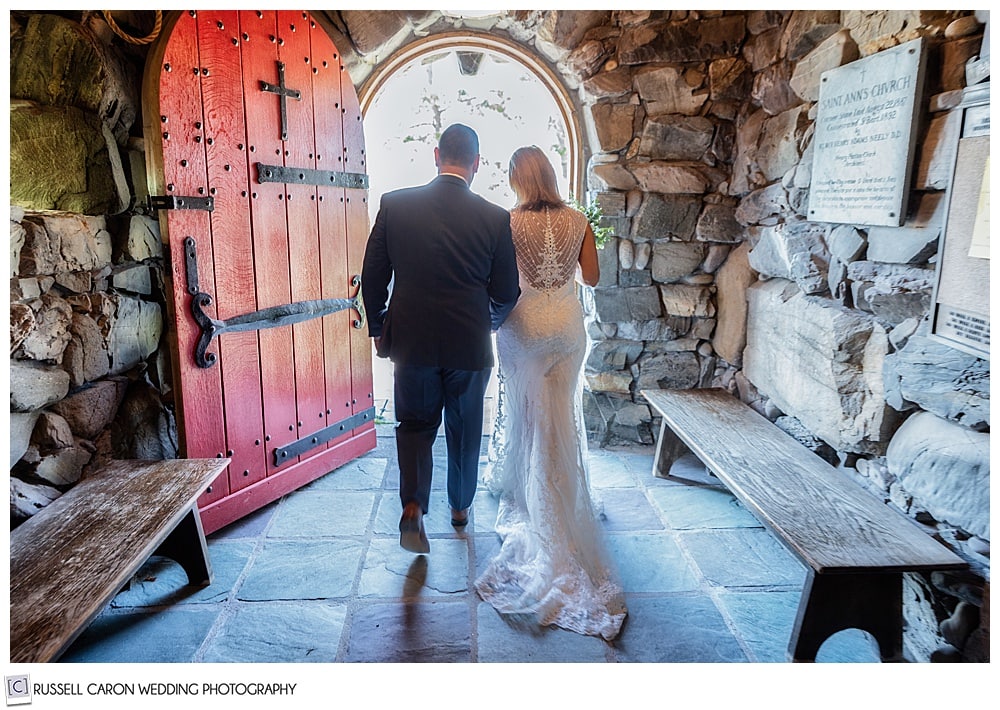 bride and groom exiting Saint Ann's Episcopal Church during their wedding ceremony in Kennebunkport, Maine