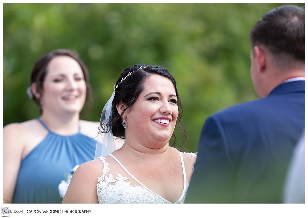 bride smiling during her wedding ceremony