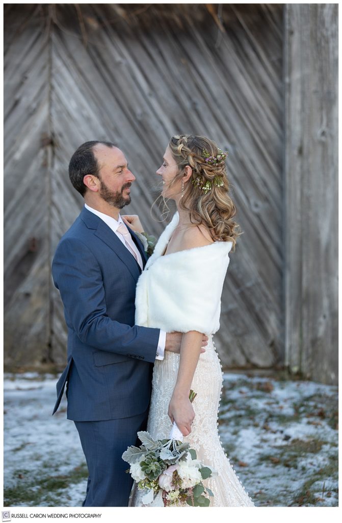 bride and groom standing together face to face