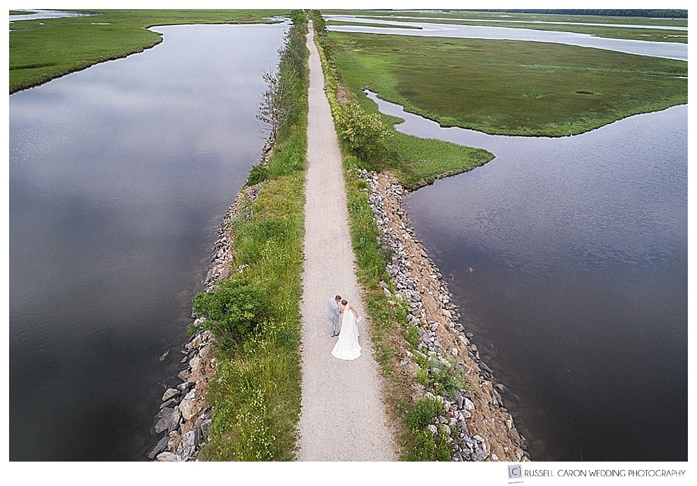 Scarborough Maine wedding drone photographer Russell Caron uses his drone to photograph a couple on the trail at Scarborough Marsh