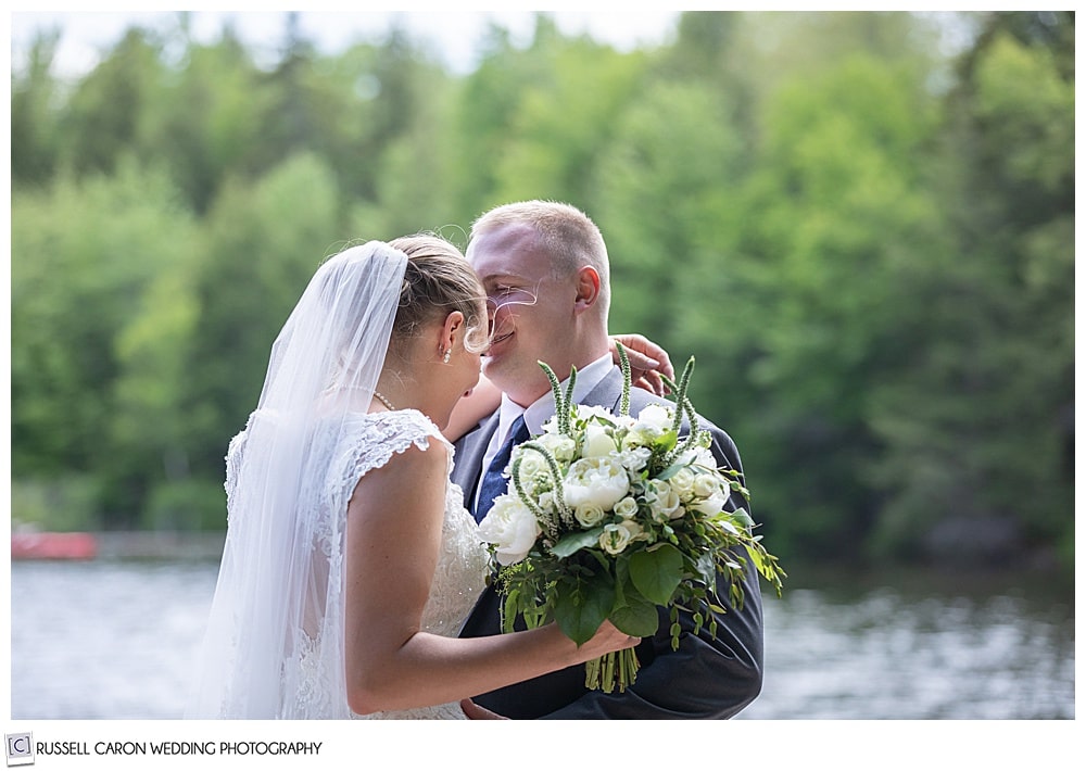 bride and groom with heads together