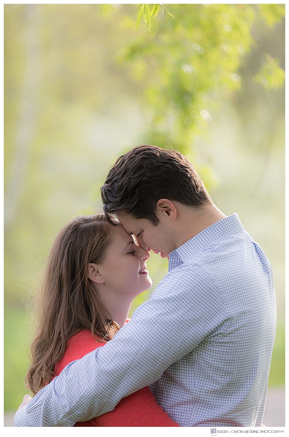 an engaged couple embraces during a quiet moment, Mowfield Farm