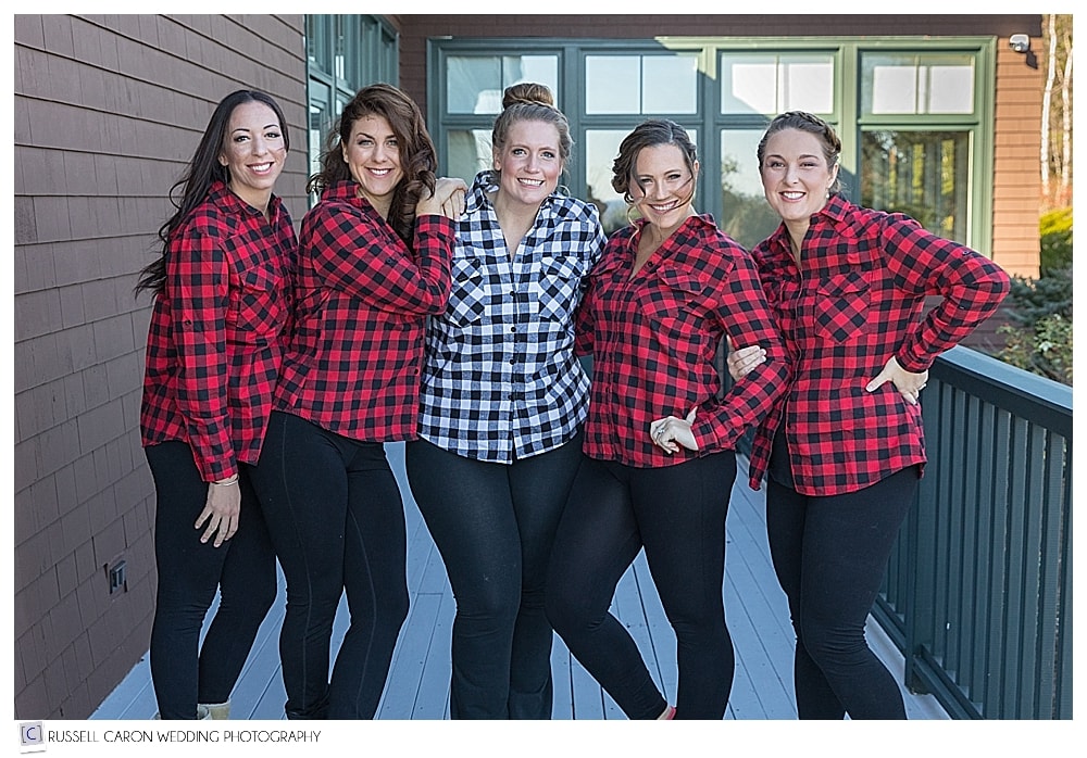 bride and bridesmaids in plaid flannel shirts