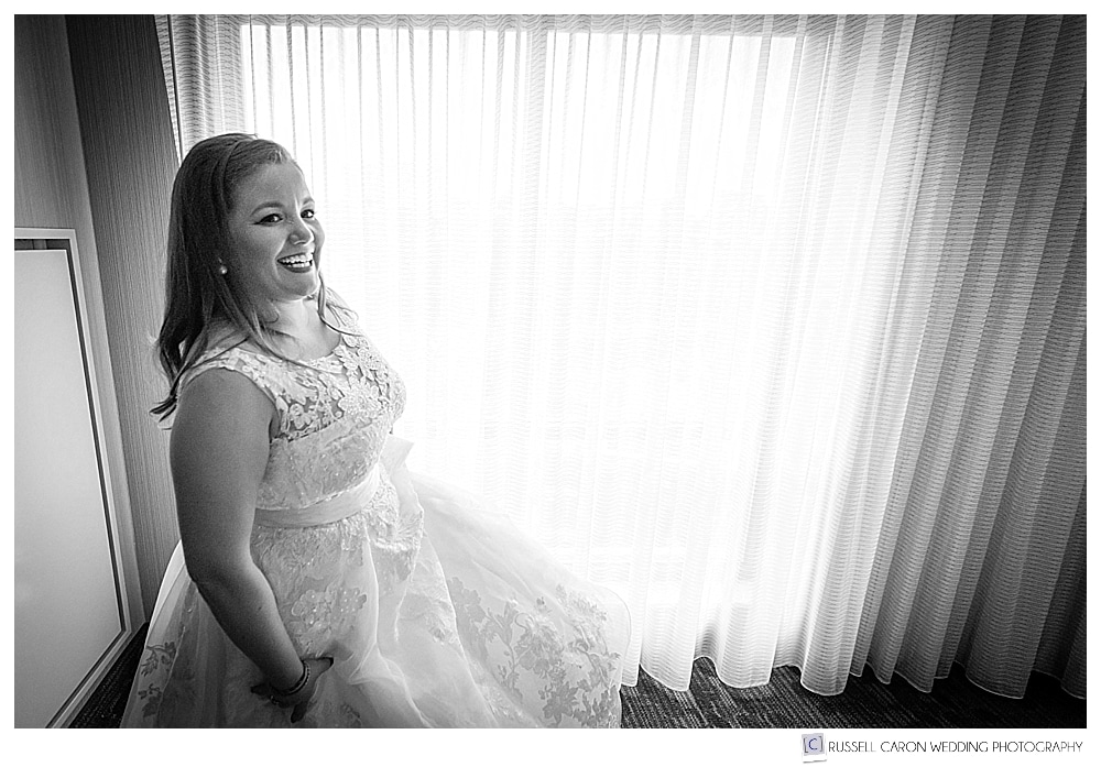 bride standing by window