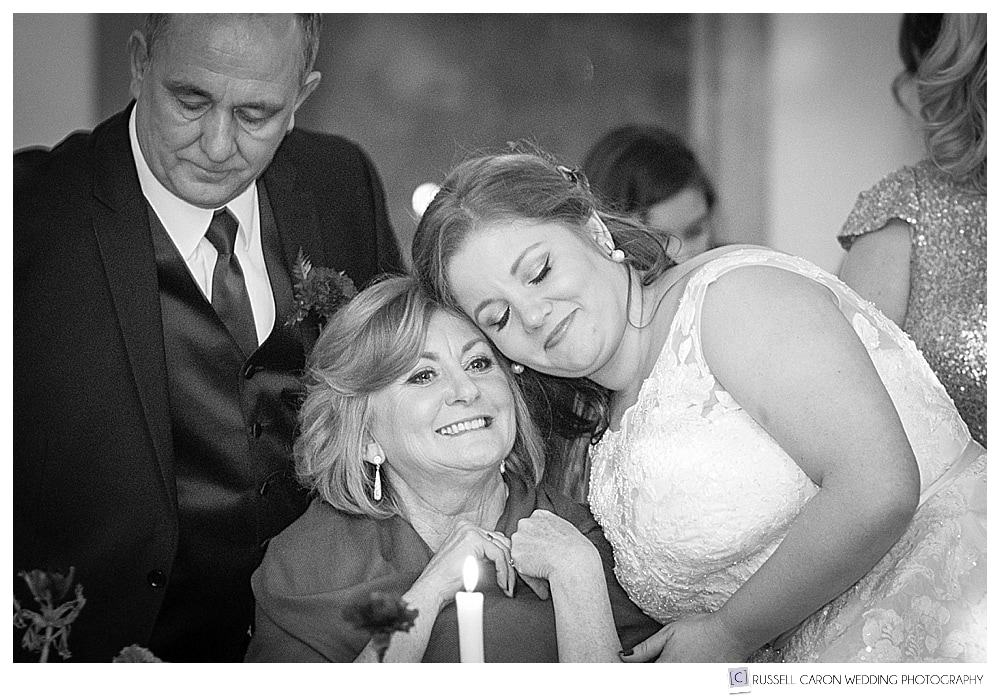 bride and her mother watch mother son dance