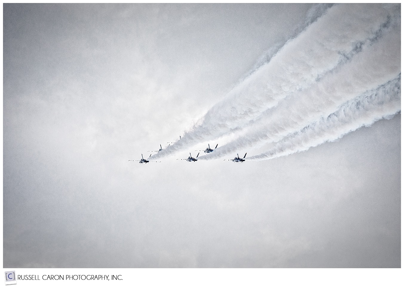 6 US Navy Blue Angels flying in Delta formation