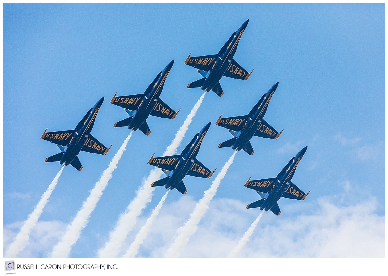 6 US Navy Blue Angels fly in delta formation directly overhead
