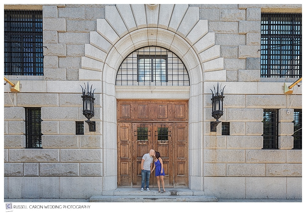 man and woman standing in doorway of stone building in Boston MA