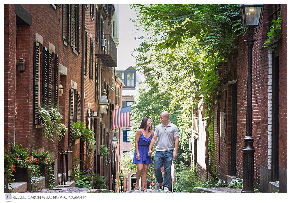couple holding hands during Acorn Street Boston engagement session