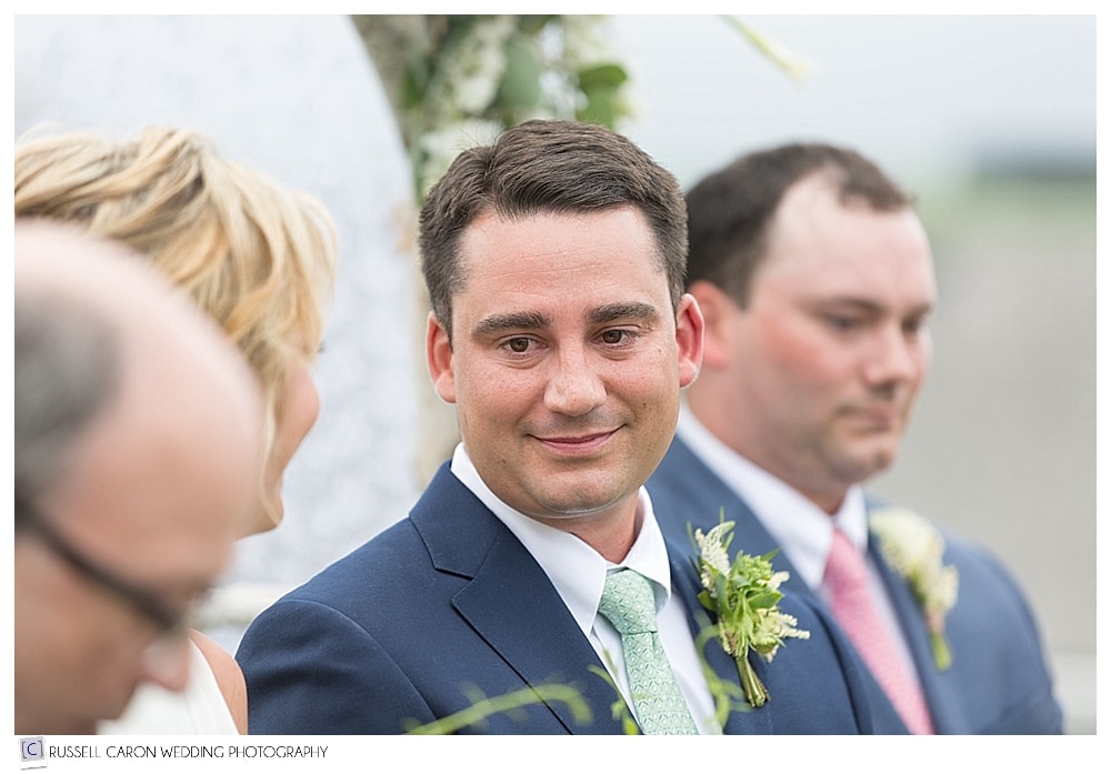 Groom looking at Bride during wedding ceremony