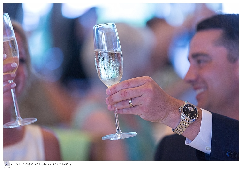 Groom with glass of champagne