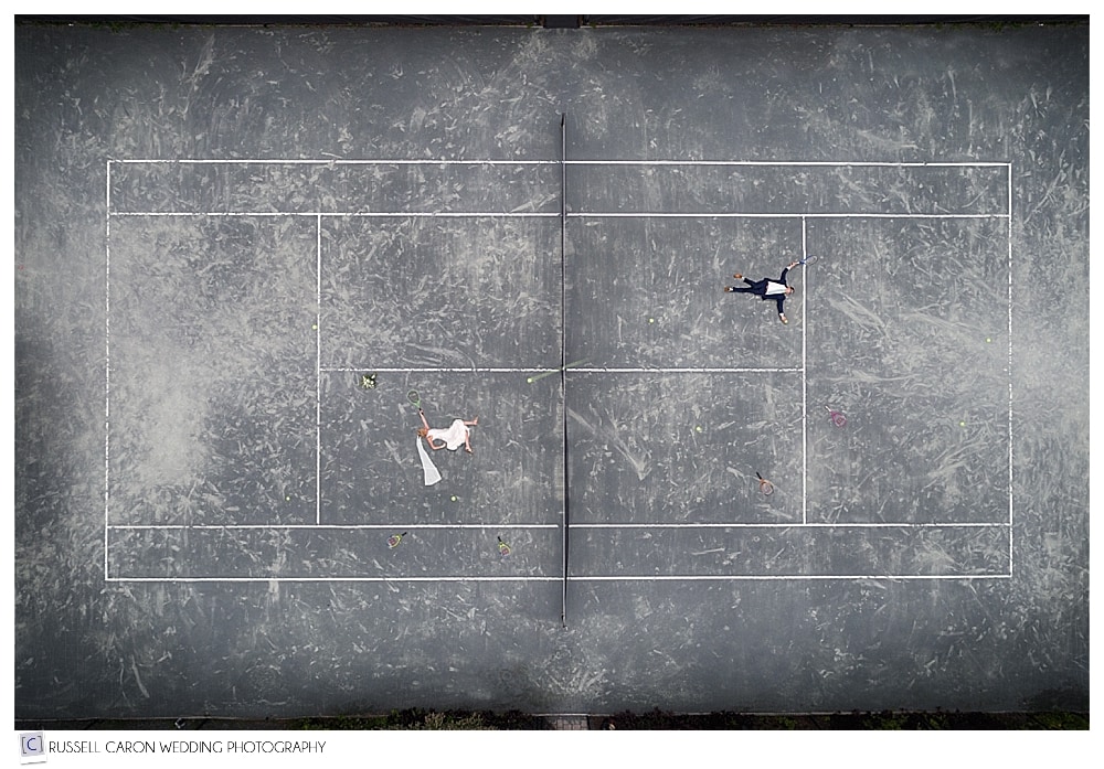 Drone wedding photo of Bride and Groom on tennis court