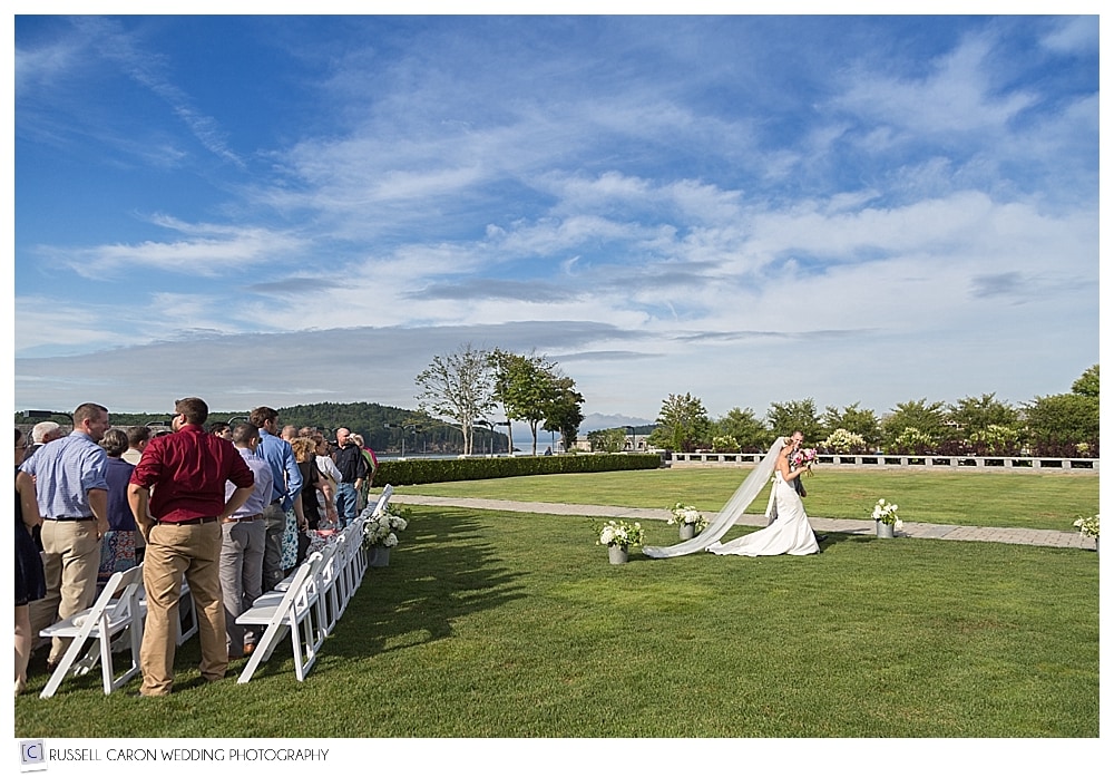 Bride and groom during recessional at their outdoor wedding ceremony at their Bar Harbor Club, Bar Harbor Maine wedding