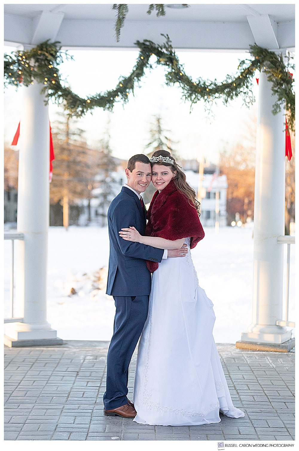 bride and groom standing in the gazebo during their Bethel Maine wedding