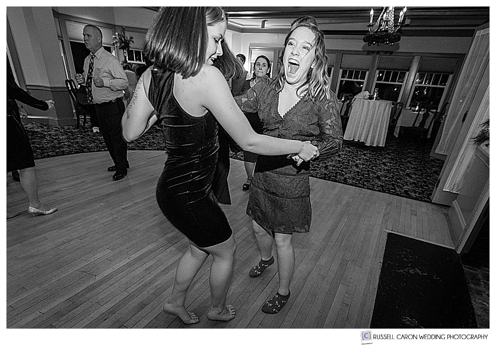 black and white photo of guests dancing