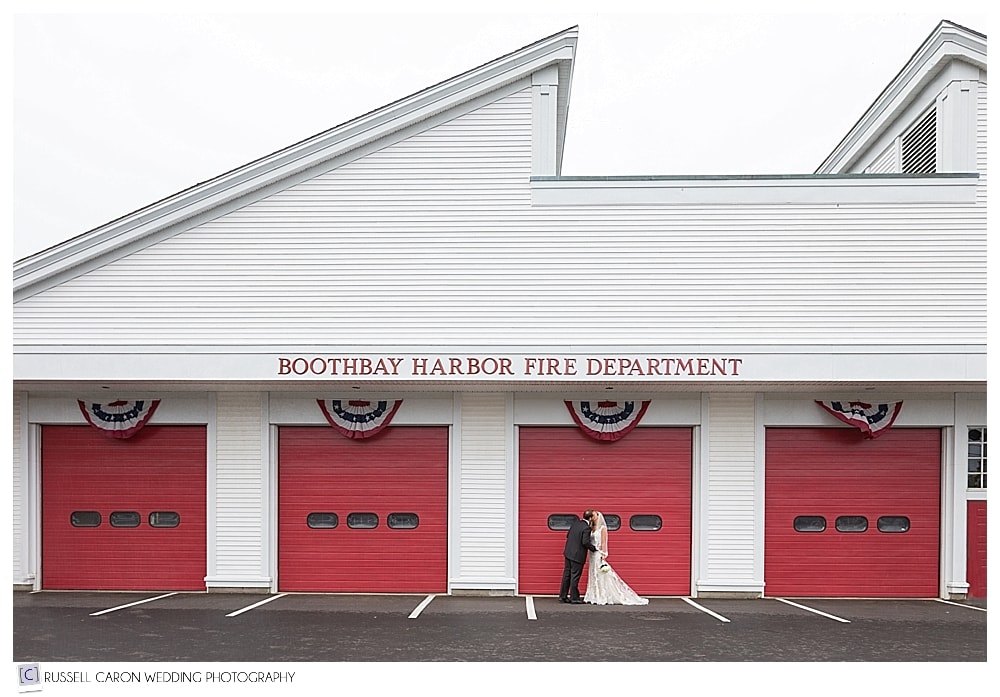 bride and groom in front of the Boothbay Harbor Maine Fire Department