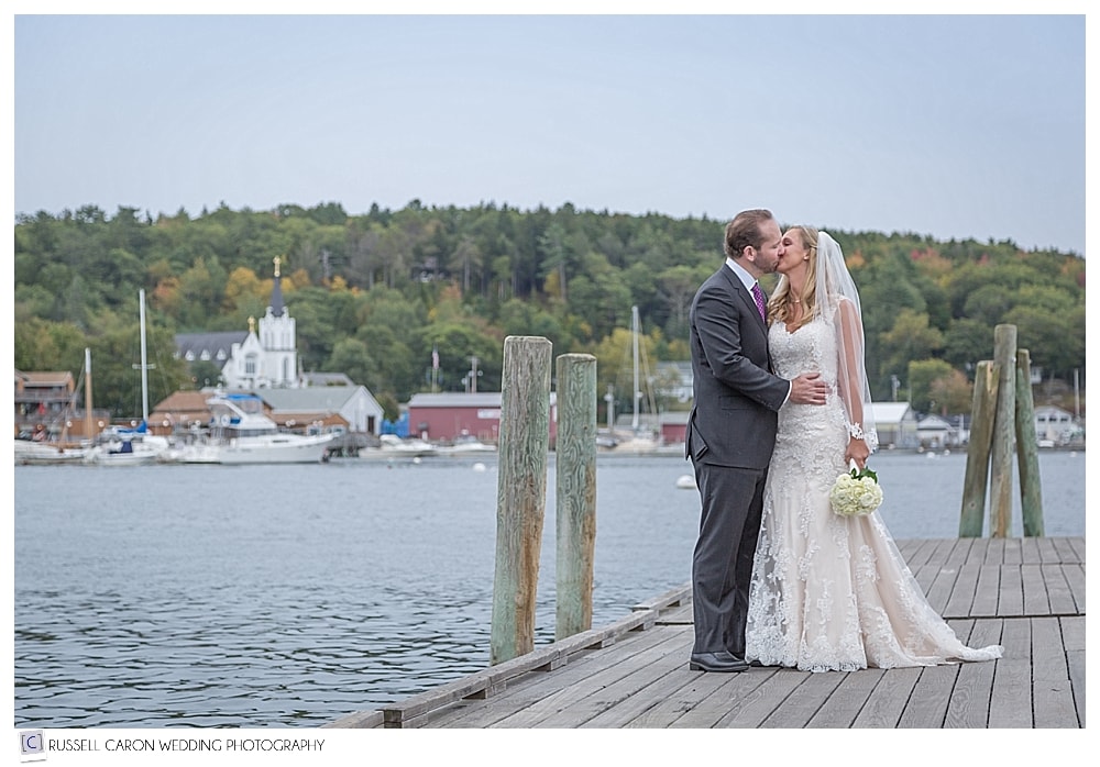 bride and groom on the dock in Boothbay Harbor maine