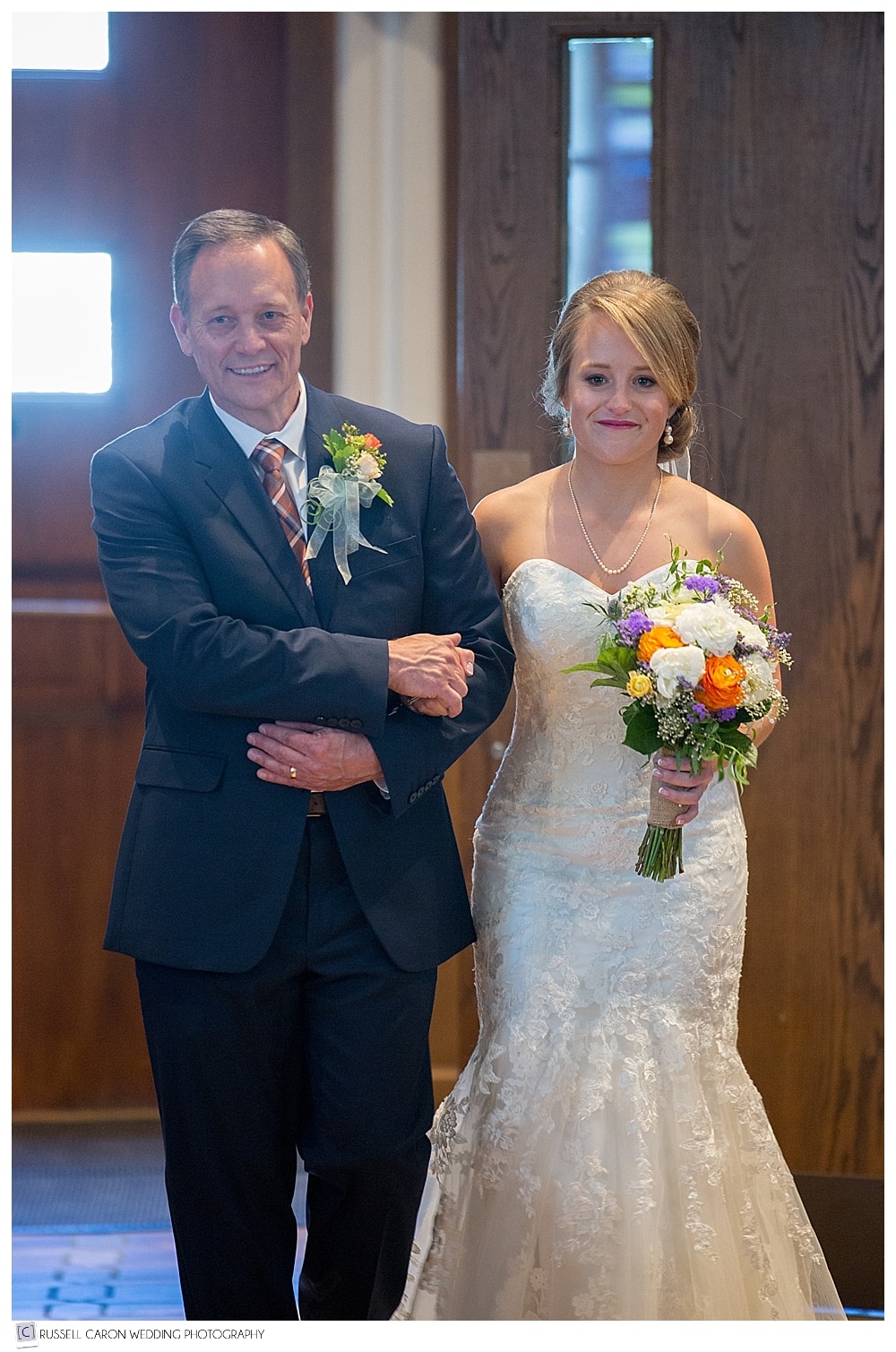bride-walking-down-the-church-aisle-with-dad