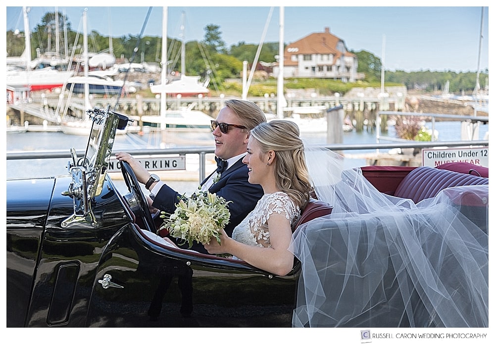 bride and groom in antique convertible at the Camden Yacht Club, Camden, Maine