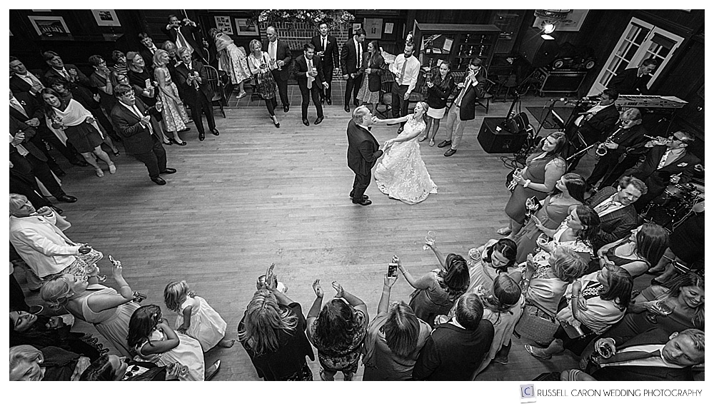 black and white photo of a bride and groom during their first dance at their camden yacht club wedding reception