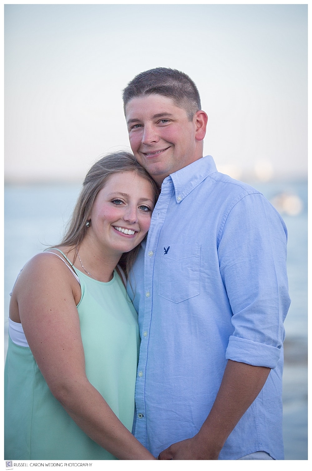 couple-smiling-during-maine-engagement-session
