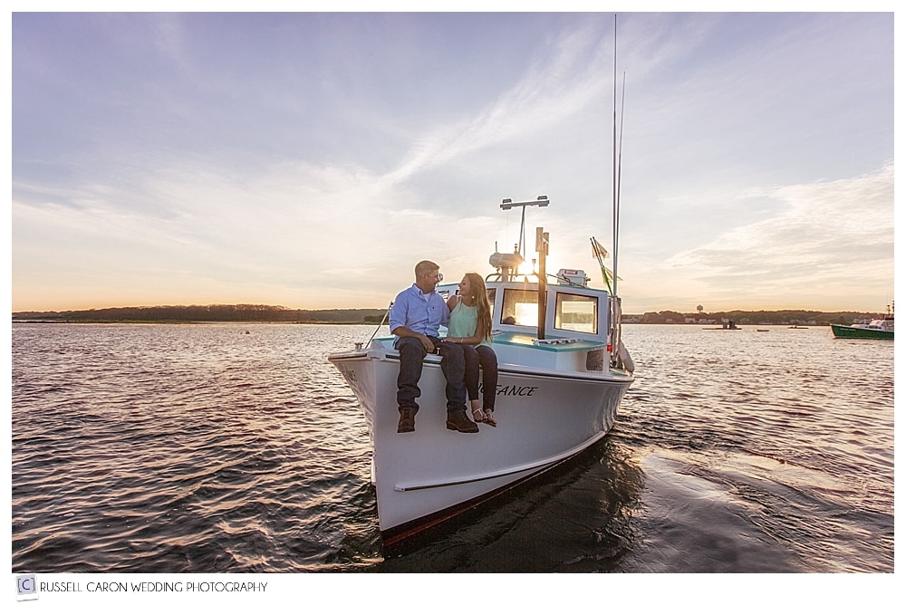 couple-on-bow-of-lobster-boat