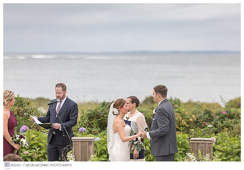 a reading during an outdoor wedding ceremony in Kennebunkport, Maine