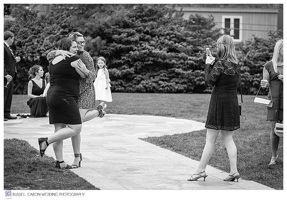 wedding guests taking a photo