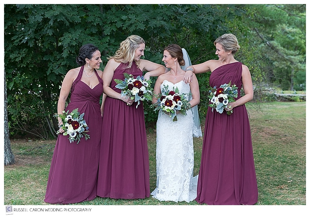 bride with bridesmaids in burgundy dresses