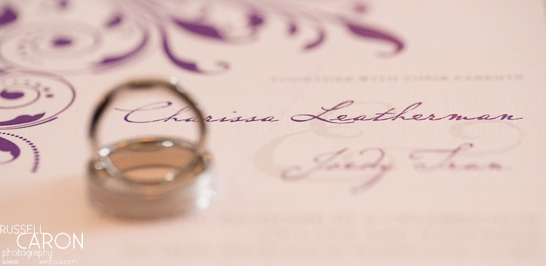 Wedding ring and wedding invitation photo