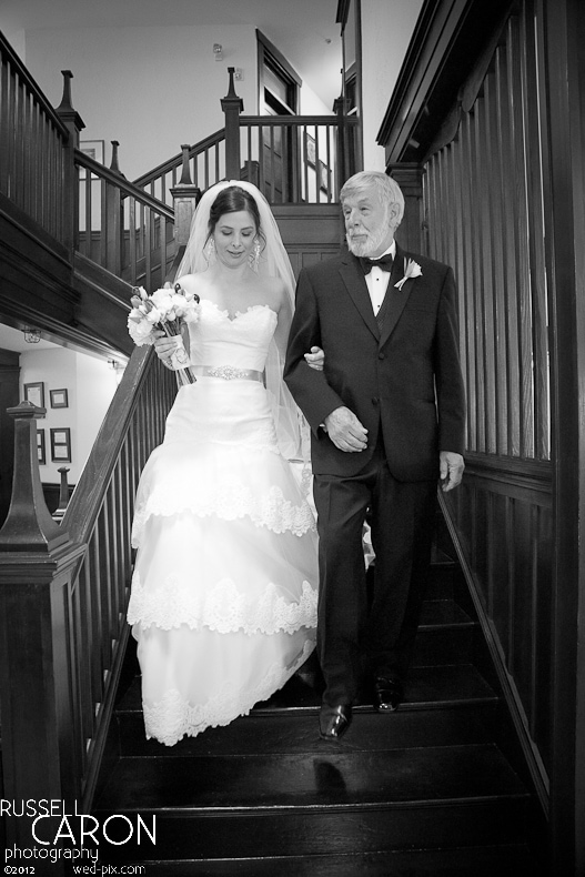 Bride and father of the bride descending the staircase at French's Point