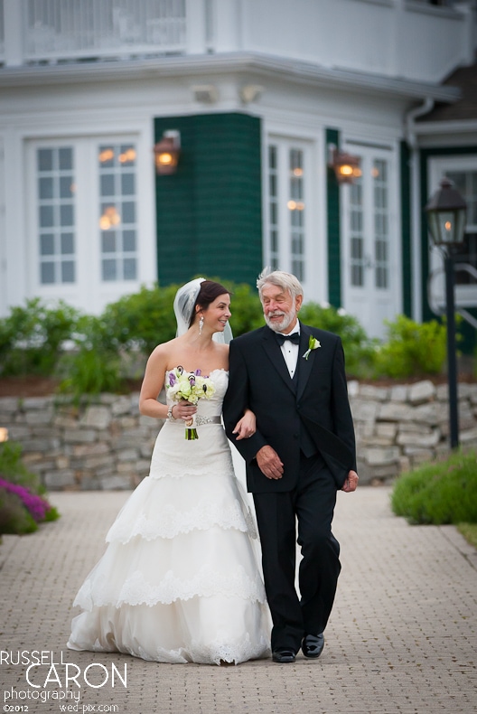 Bride and father of the bride as they begin their walk down the aisle at French's Point