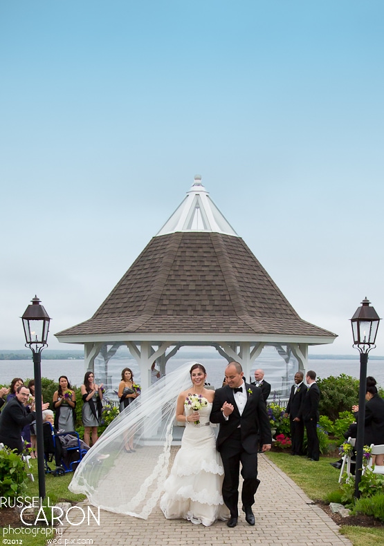 Bride and groom during wedding ceremony recessional at French's Point