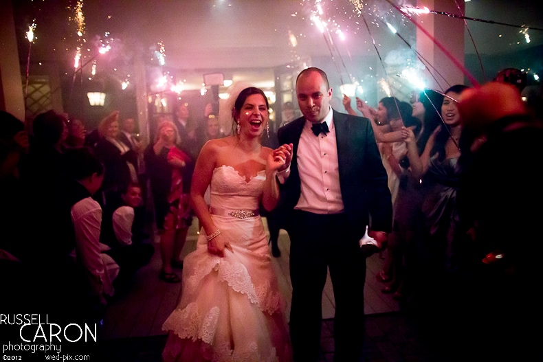 Bride and groom during sparkler exit