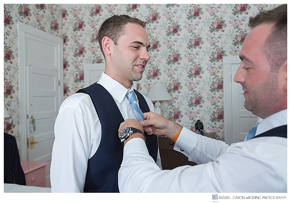 groom having his tie adjusted by his best man, colony hotel kennebunkport maine