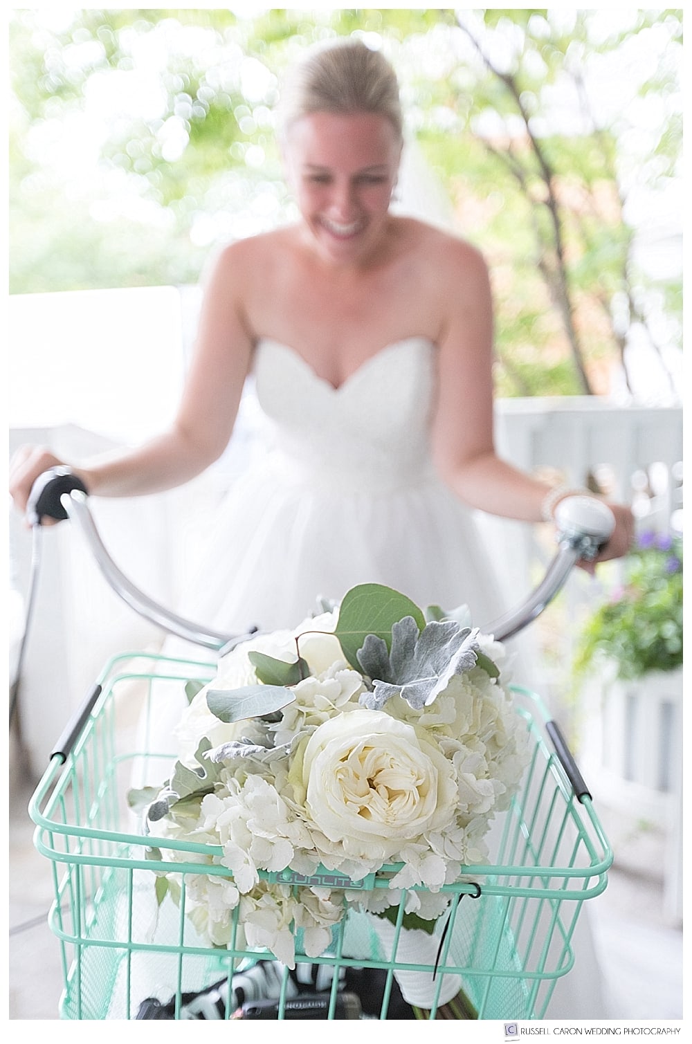 bride on bike, with bouquet in bike basket
