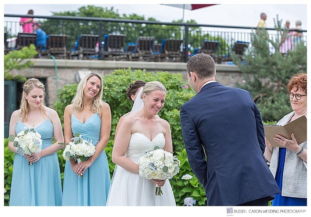 bride laughing during wedding ceremony in Kennebunkport, Maine