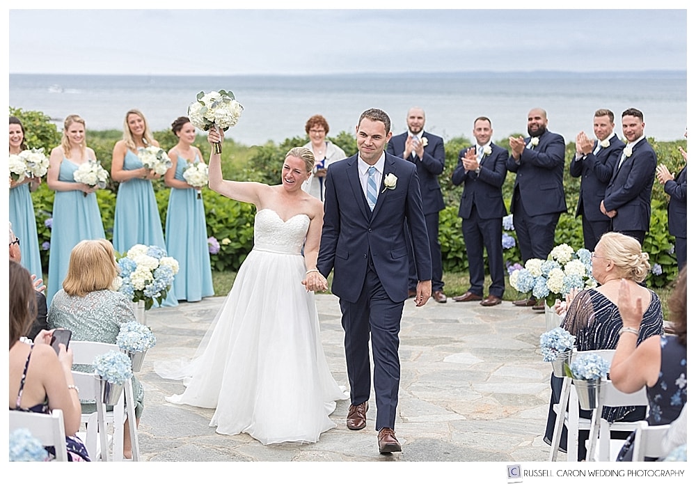 bride and groom during their recessional at the colony hotel, kennebunkport, maine