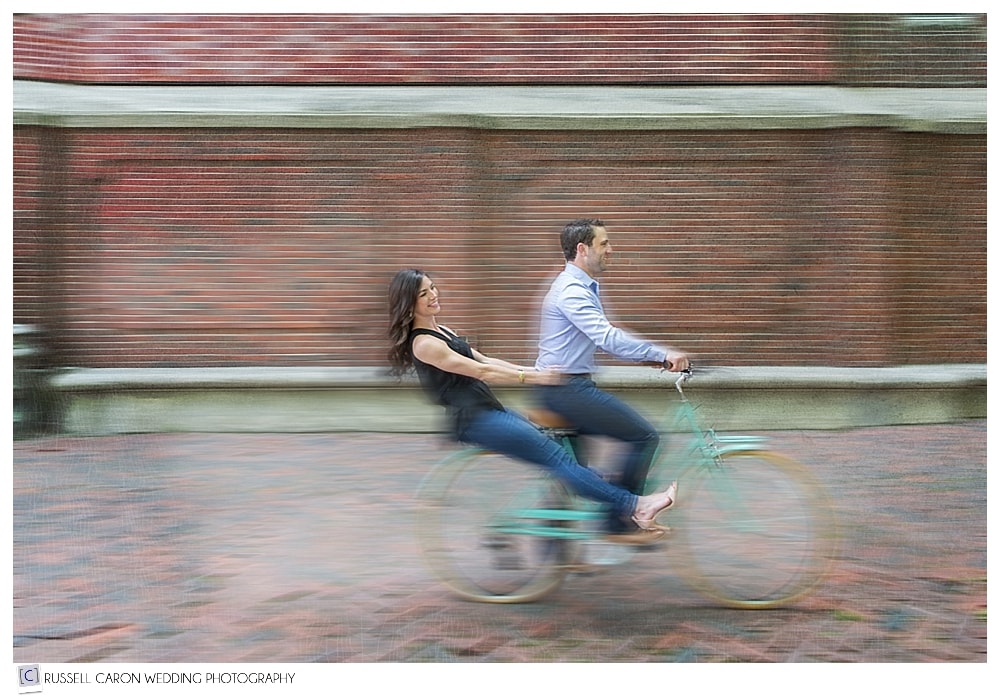 couple-riding-bicycle-in-north-end-boston