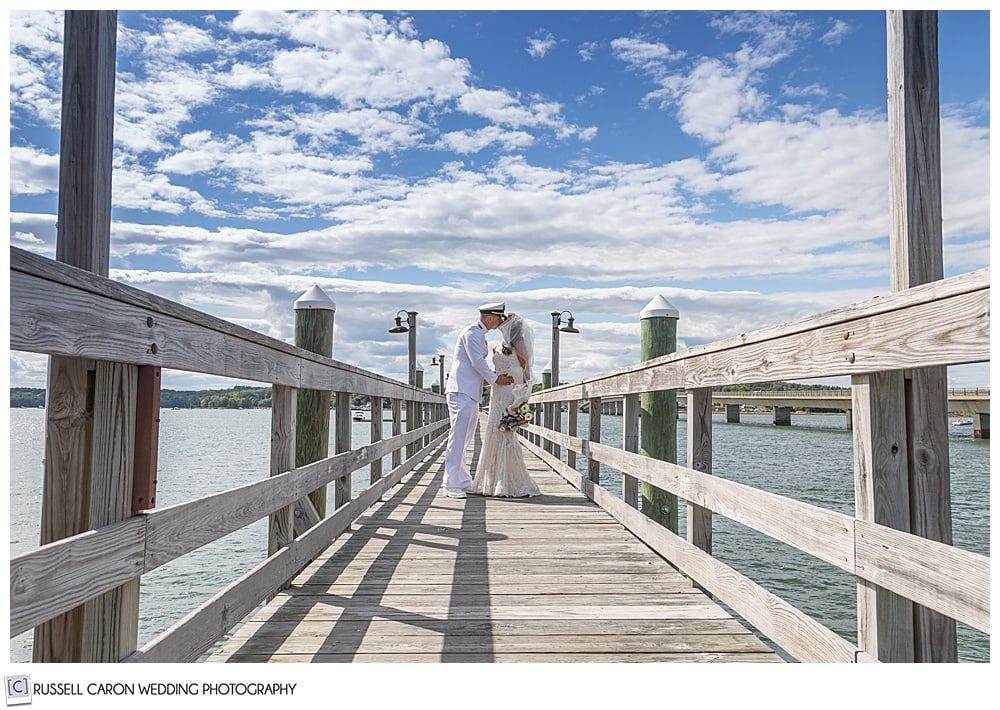 bride and groom kissing on the dock at the Sheepscot Harbour Village Resort