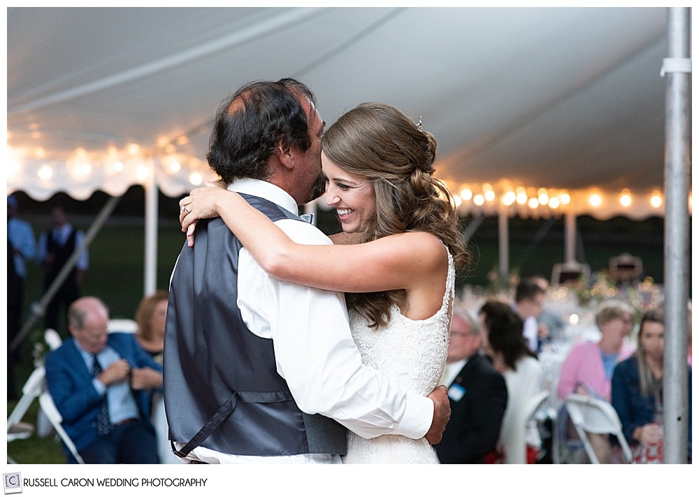 father daughter dance, bride is smiling