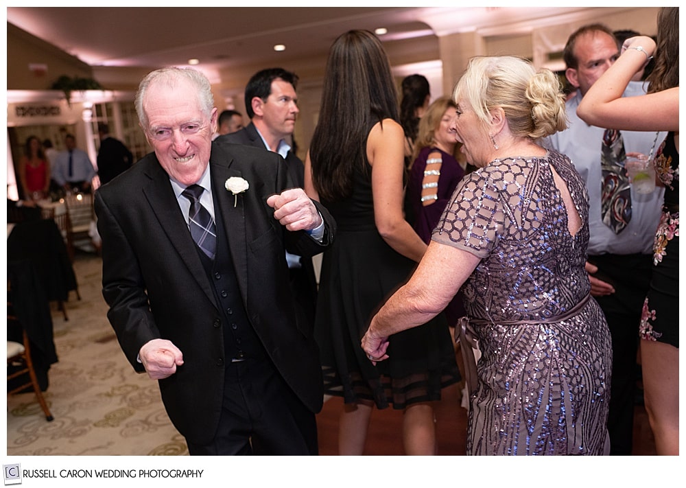 grandparents dancing at wedding reception