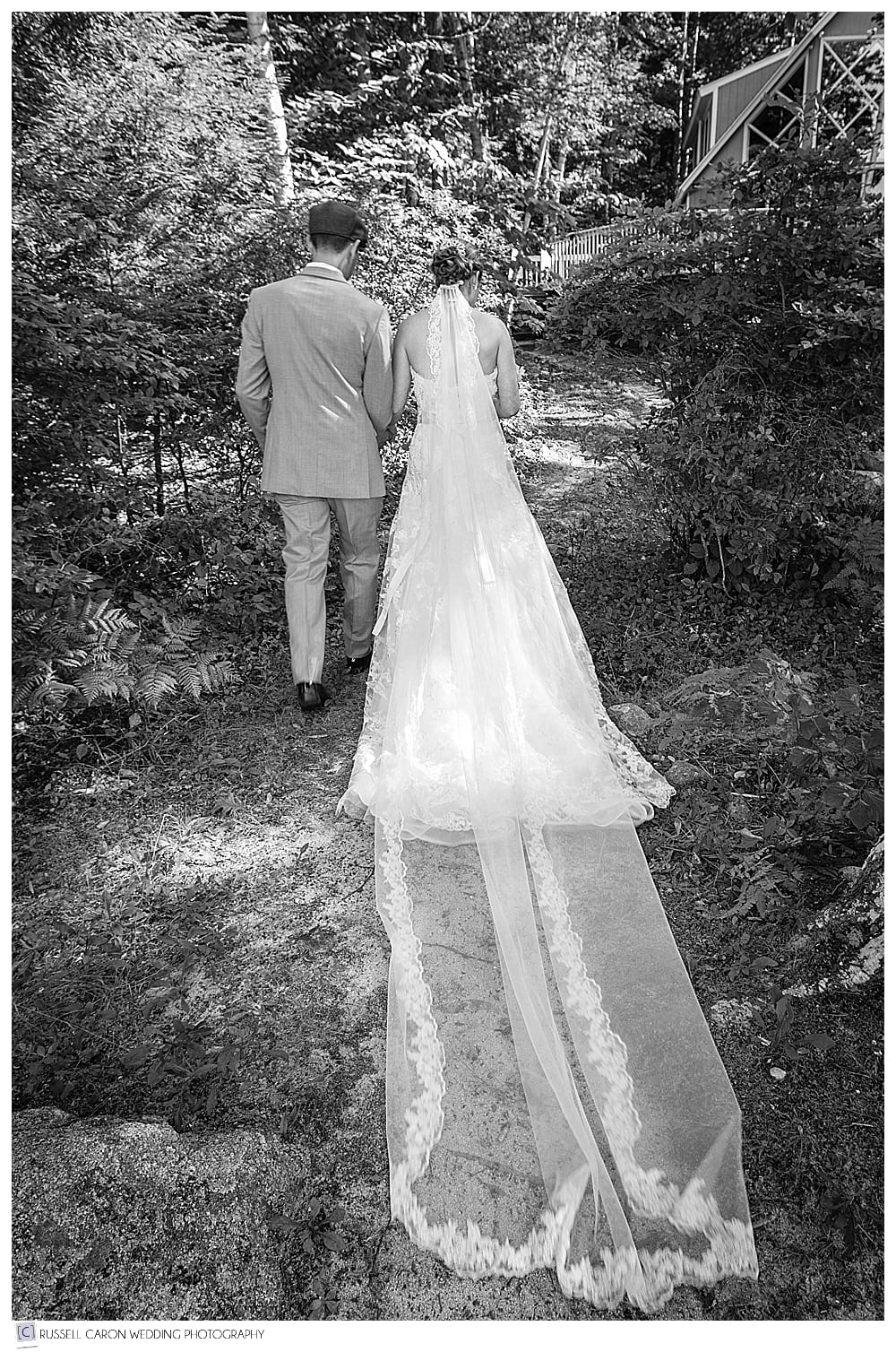 bride and groom walking away after their recessional