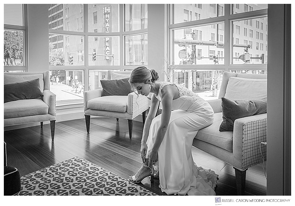 bride getting ready, bride putting on shoes