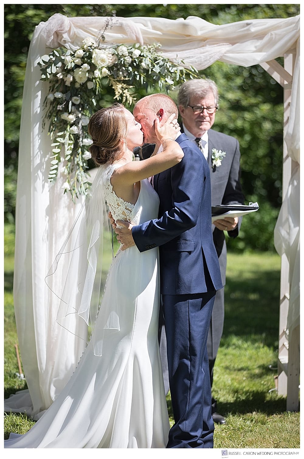 bride and groom's first kiss, Maine Audubon wedding photographers