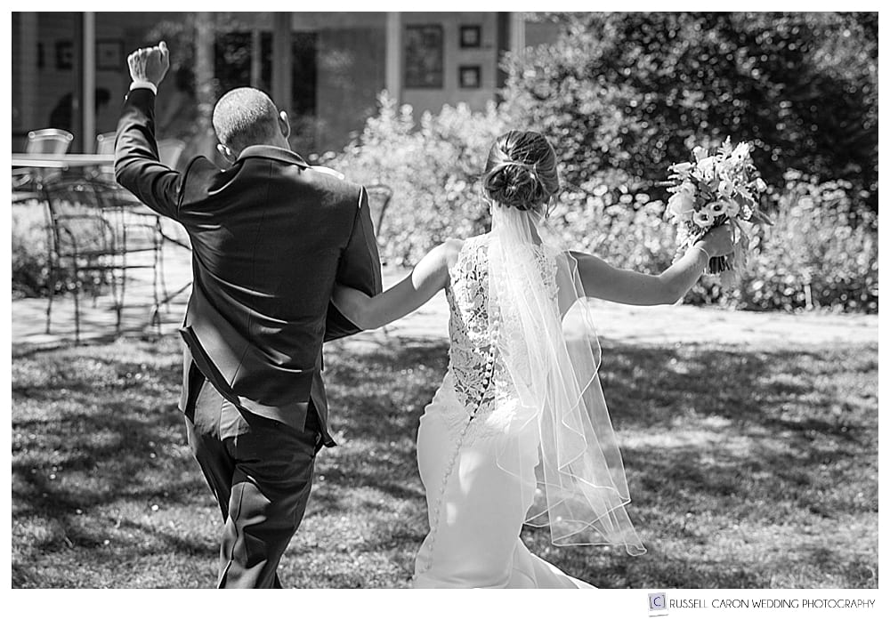 bride and groom after wedding recessional at Maine Audubon, Maine Audubon wedding photography team